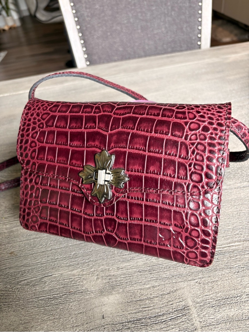 Patricia Nash Burgundy Croc-Embossed Crossbody with Floral Turnlock